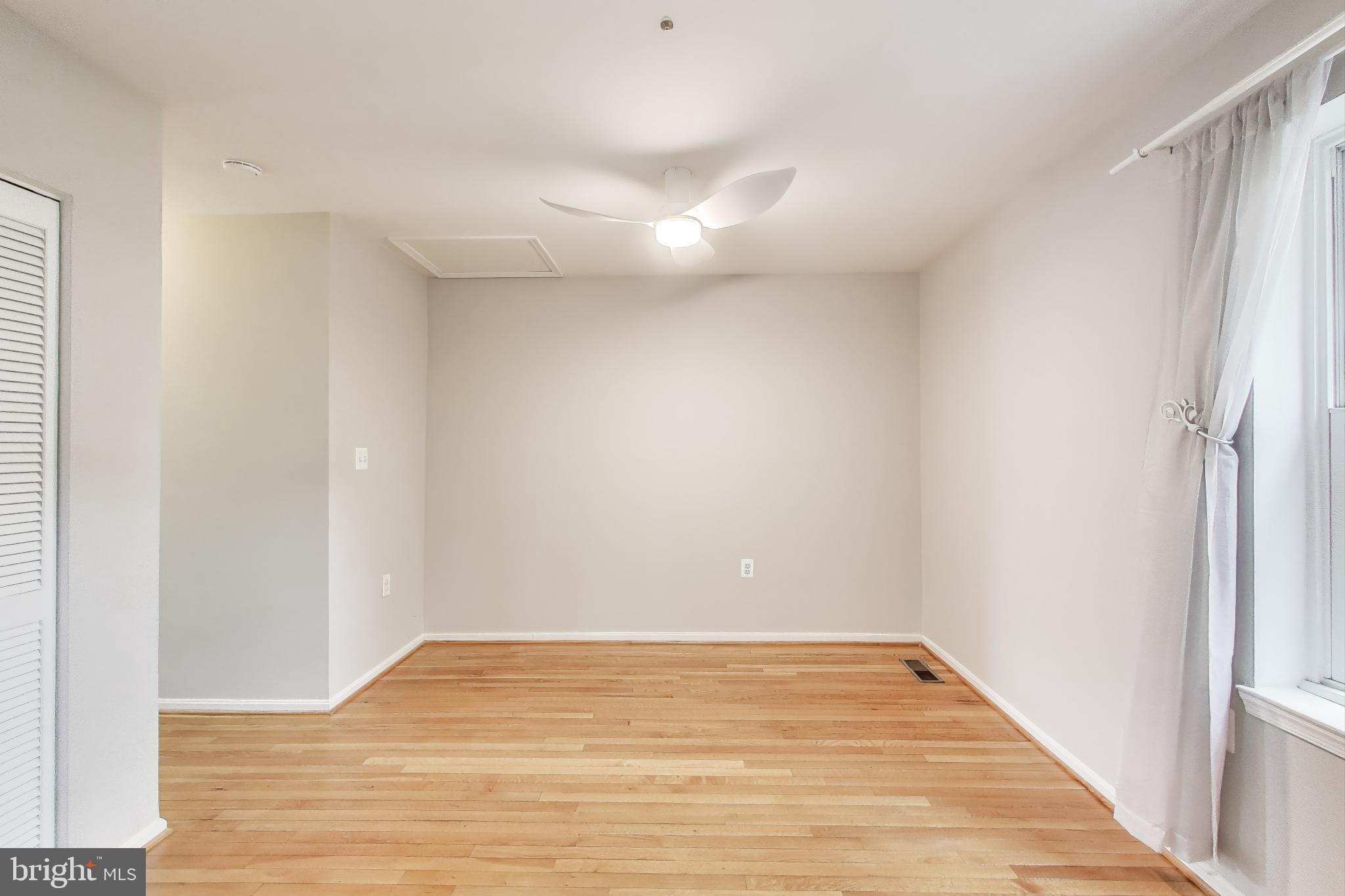 763 3rd Street Northeast Washington, DC 20002 - Photo 16 of 32 a view of empty room with wooden floor