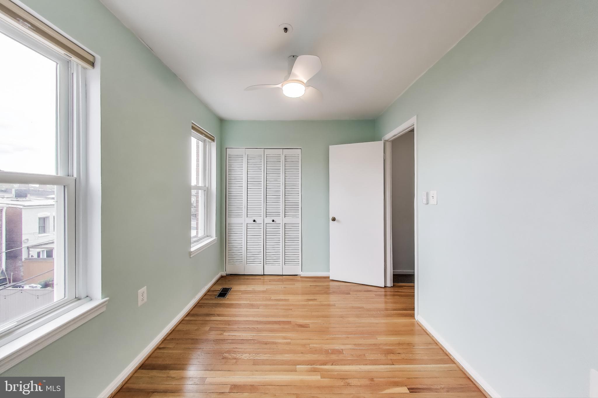763 3rd Street Northeast Washington, DC 20002 - Photo 19 of 32 a view of a room with wooden floor and window