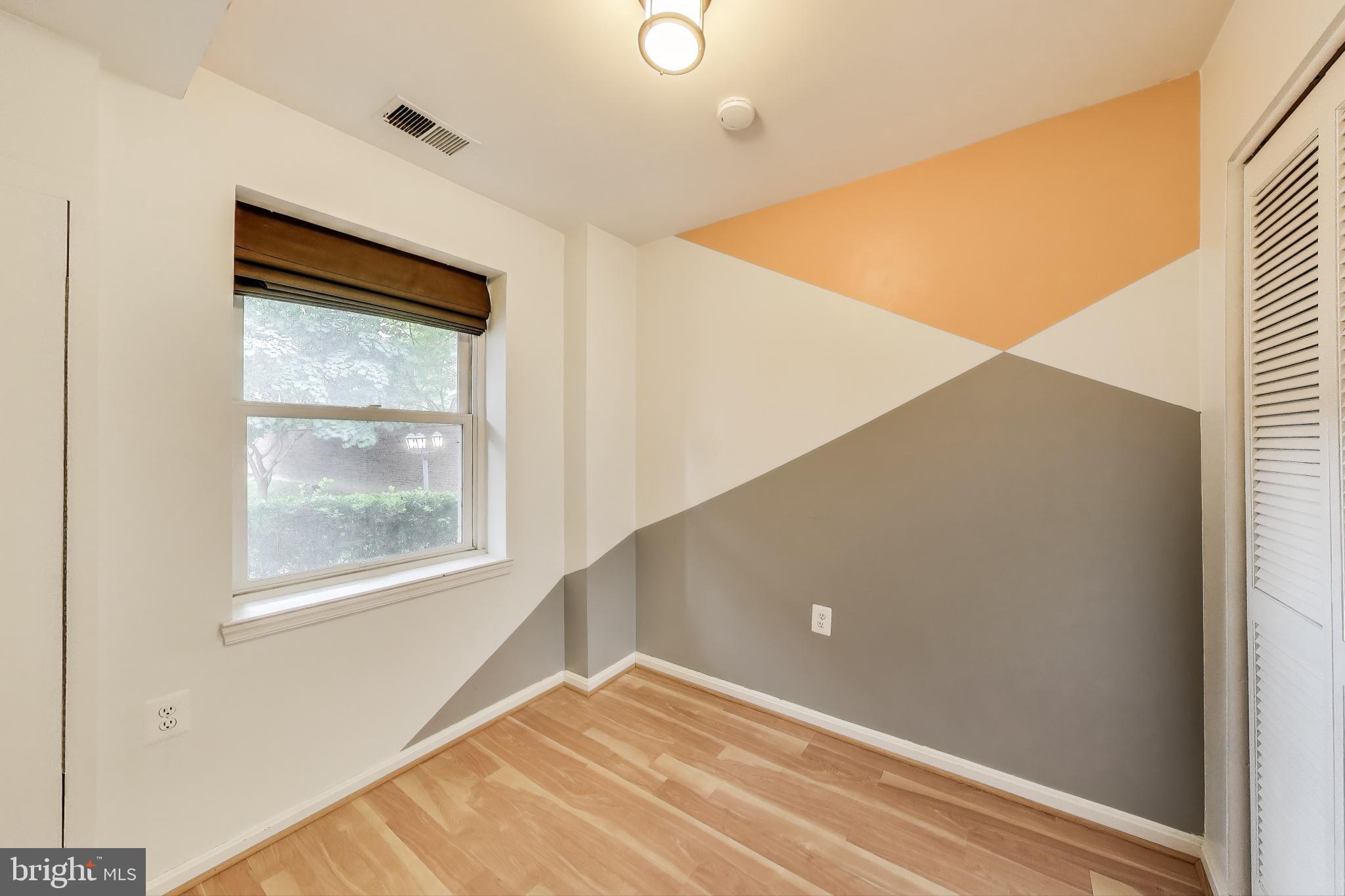 763 3rd Street Northeast Washington, DC 20002 - Photo 4 of 32 a view of an empty room with a window