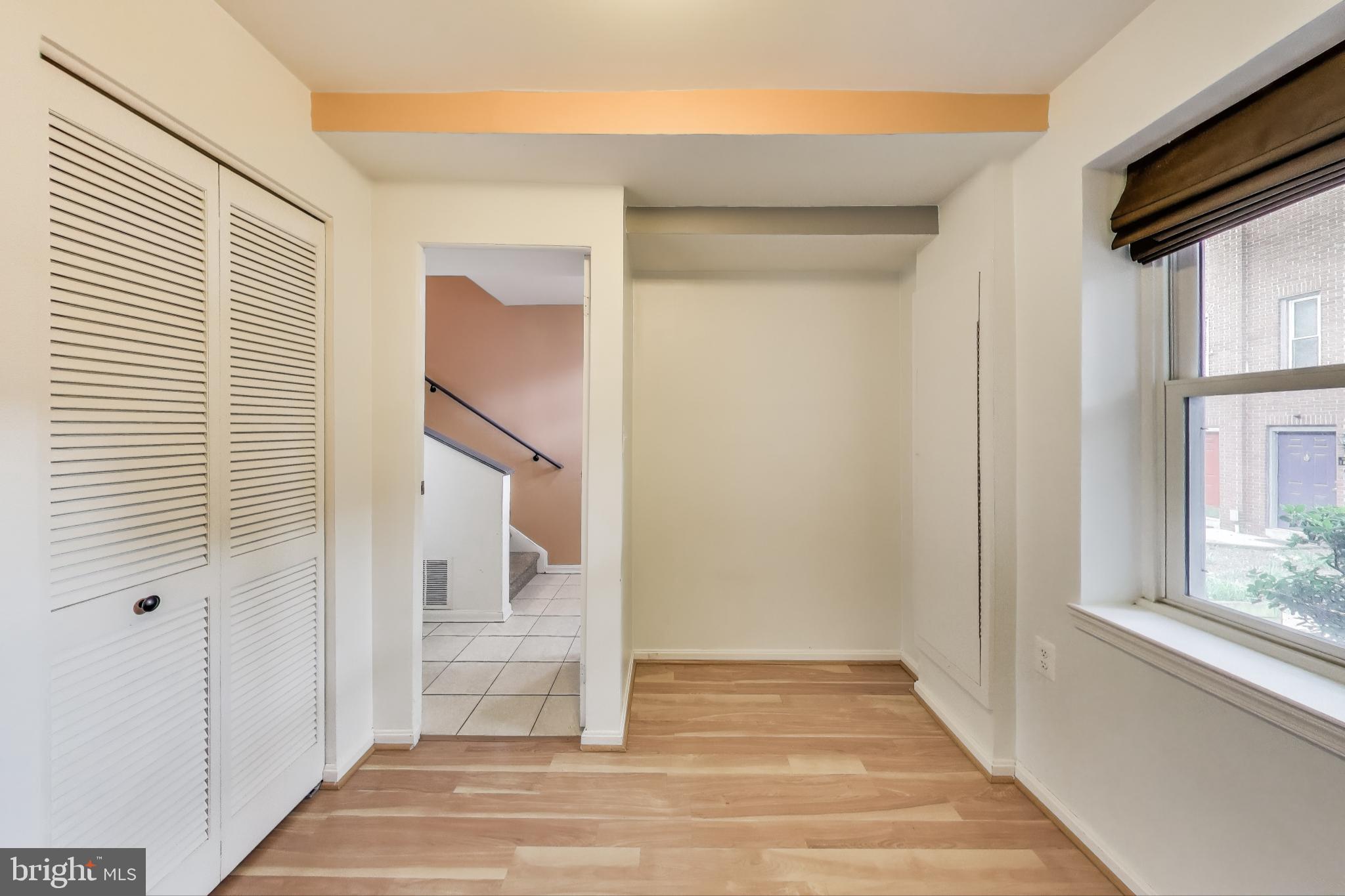 763 3rd Street Northeast Washington, DC 20002 - Photo 5 of 32 a view of a hallway view with wooden floor and staircase