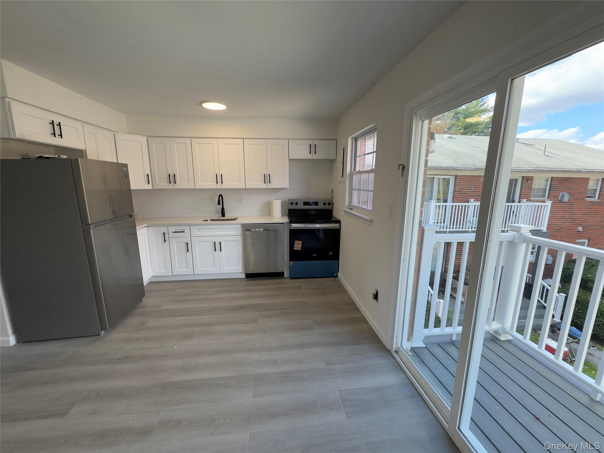 5 Wildwood Drive, Unit 5C Wappingers Falls, NY 12590 - Photo 5 of 11 a view of a kitchen with a stove top oven