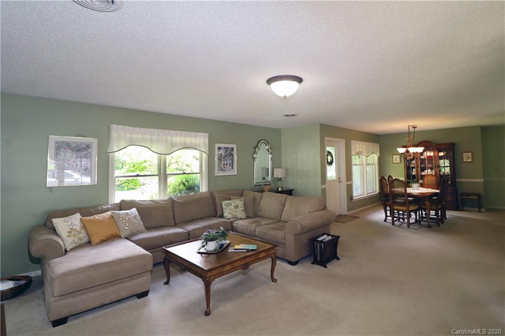 44 Jervey Road, Unit 2B Tryon, NC 28782 - Photo 14 of 24 a living room with furniture and a large window
