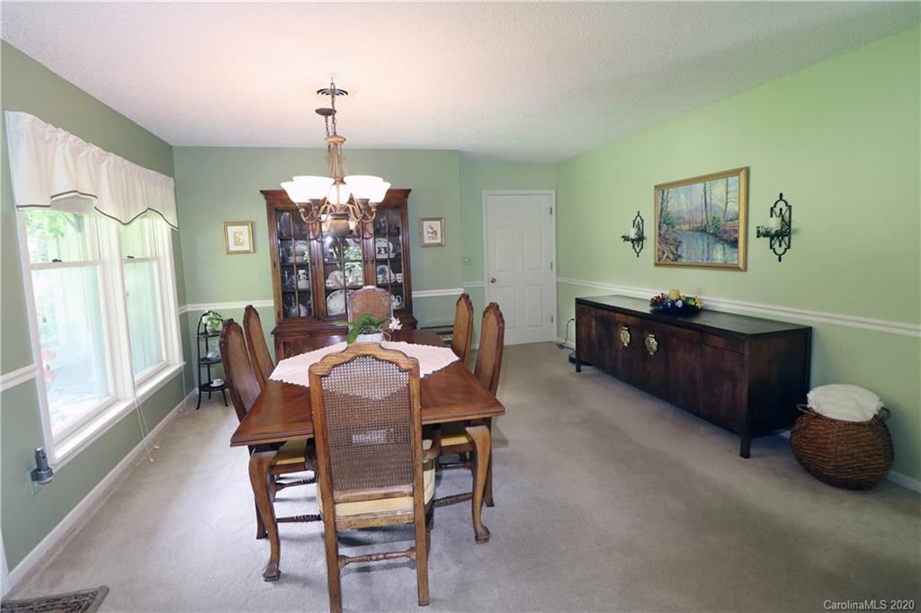 44 Jervey Road, Unit 2B Tryon, NC 28782 - Photo 15 of 24 a dining room with furniture and window