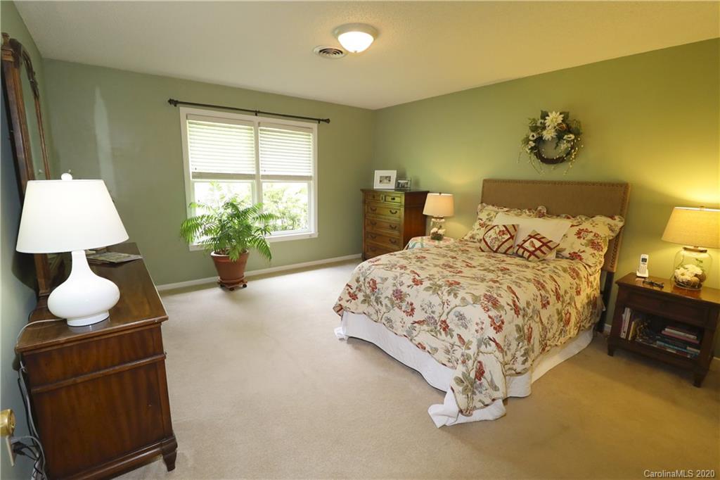 44 Jervey Road, Unit 2B Tryon, NC 28782 - Photo 16 of 24 a bedroom with a bed and window