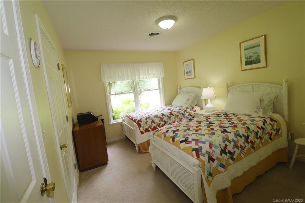 44 Jervey Road, Unit 2B Tryon, NC 28782 - Photo 22 of 24 a bedroom with a bed and window