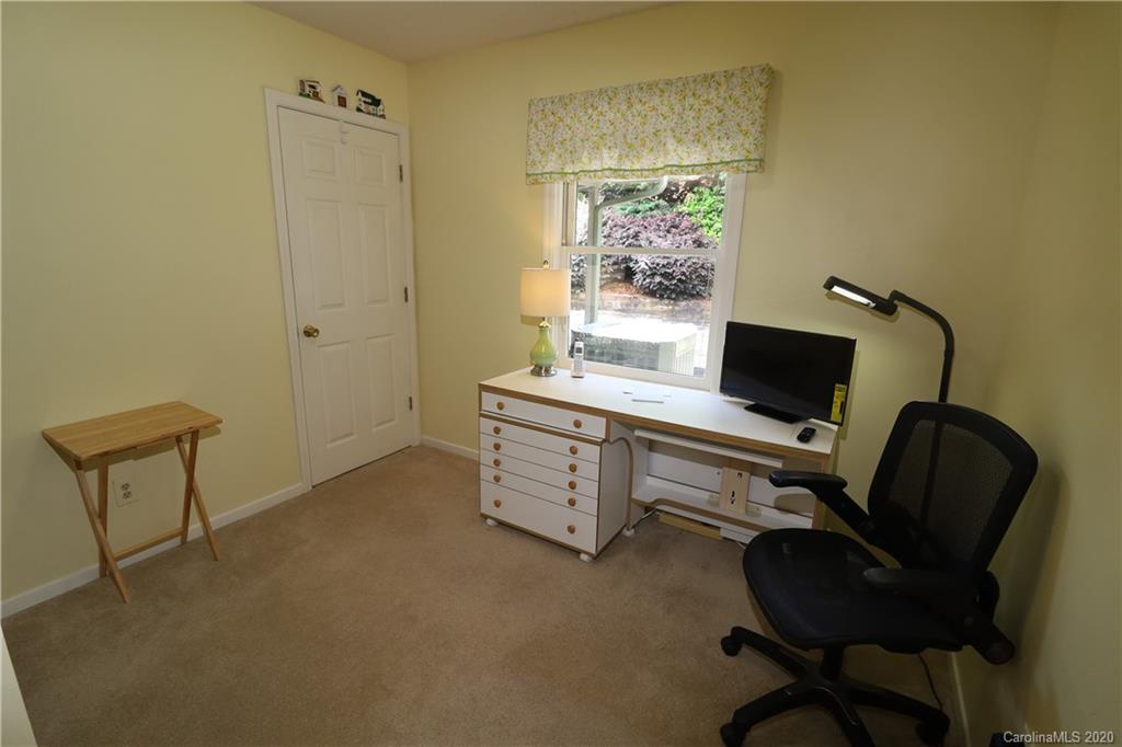 44 Jervey Road, Unit 2B Tryon, NC 28782 - Photo 23 of 24 a view of a workspace with furniture and a window