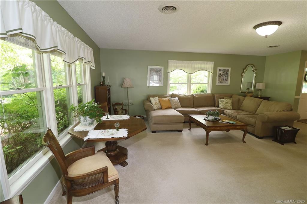 44 Jervey Road, Unit 2B Tryon, NC 28782 - Photo 8 of 24 a living room with furniture and a large window