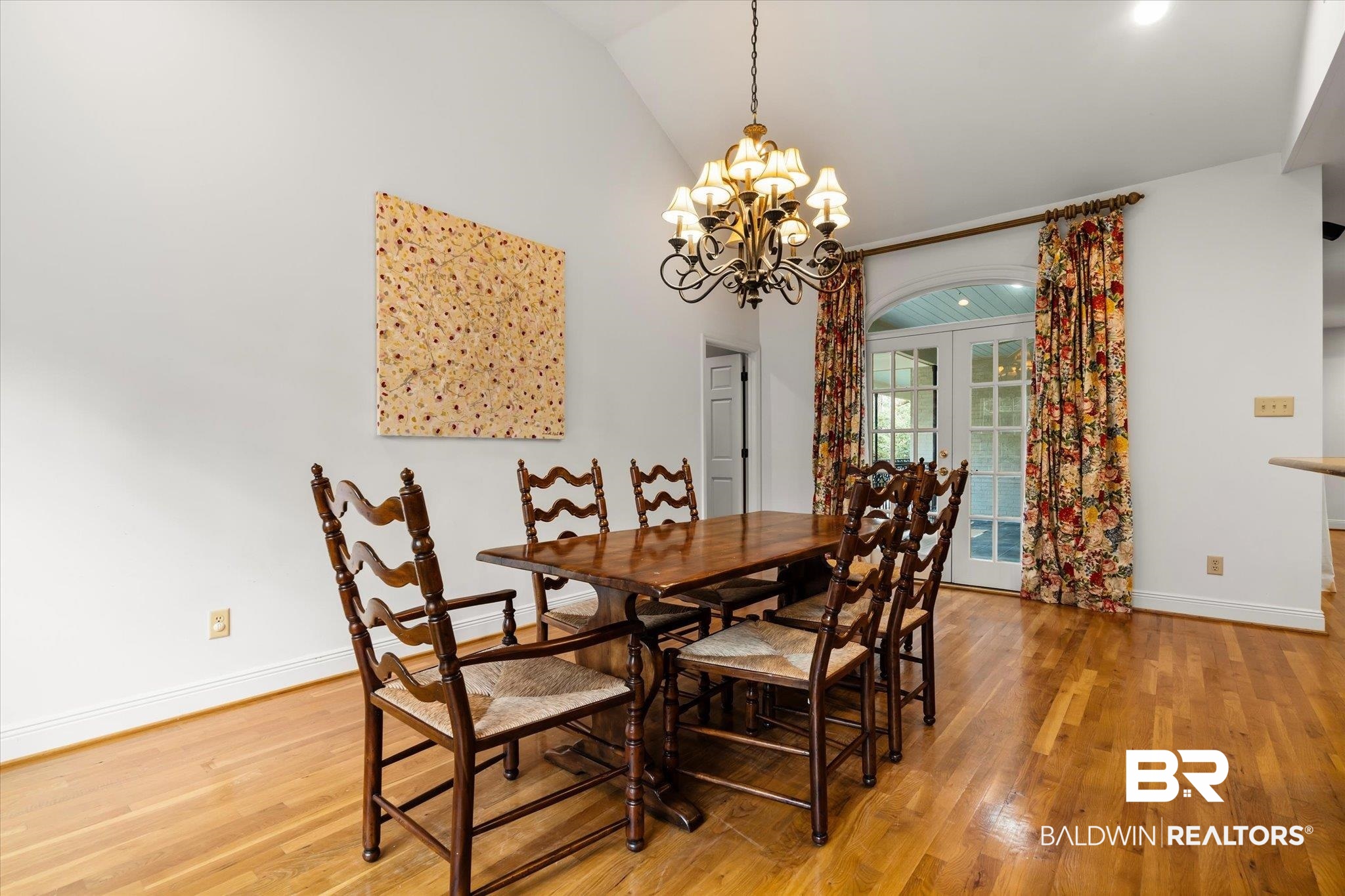 143 Myrtlewood Lane Mobile, AL 36608 - Photo 13 of 55 Dining area with baseboards, light wood finished floors, an inviting chandelier, lofted ceiling, and french doors