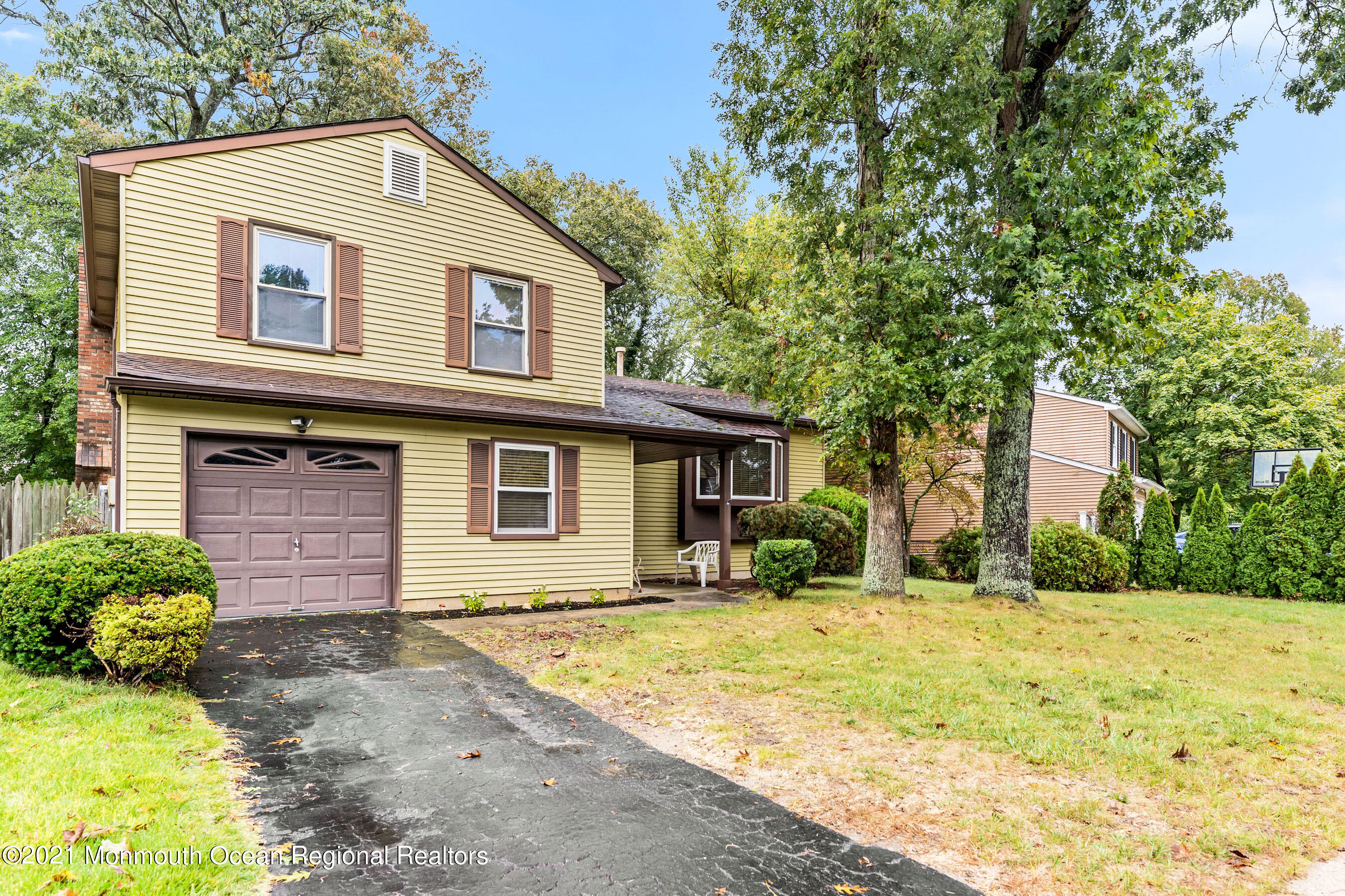 11 Flintlock Drive Howell, NJ 07731 - Photo 26 of 29 a front view of a house with a yard