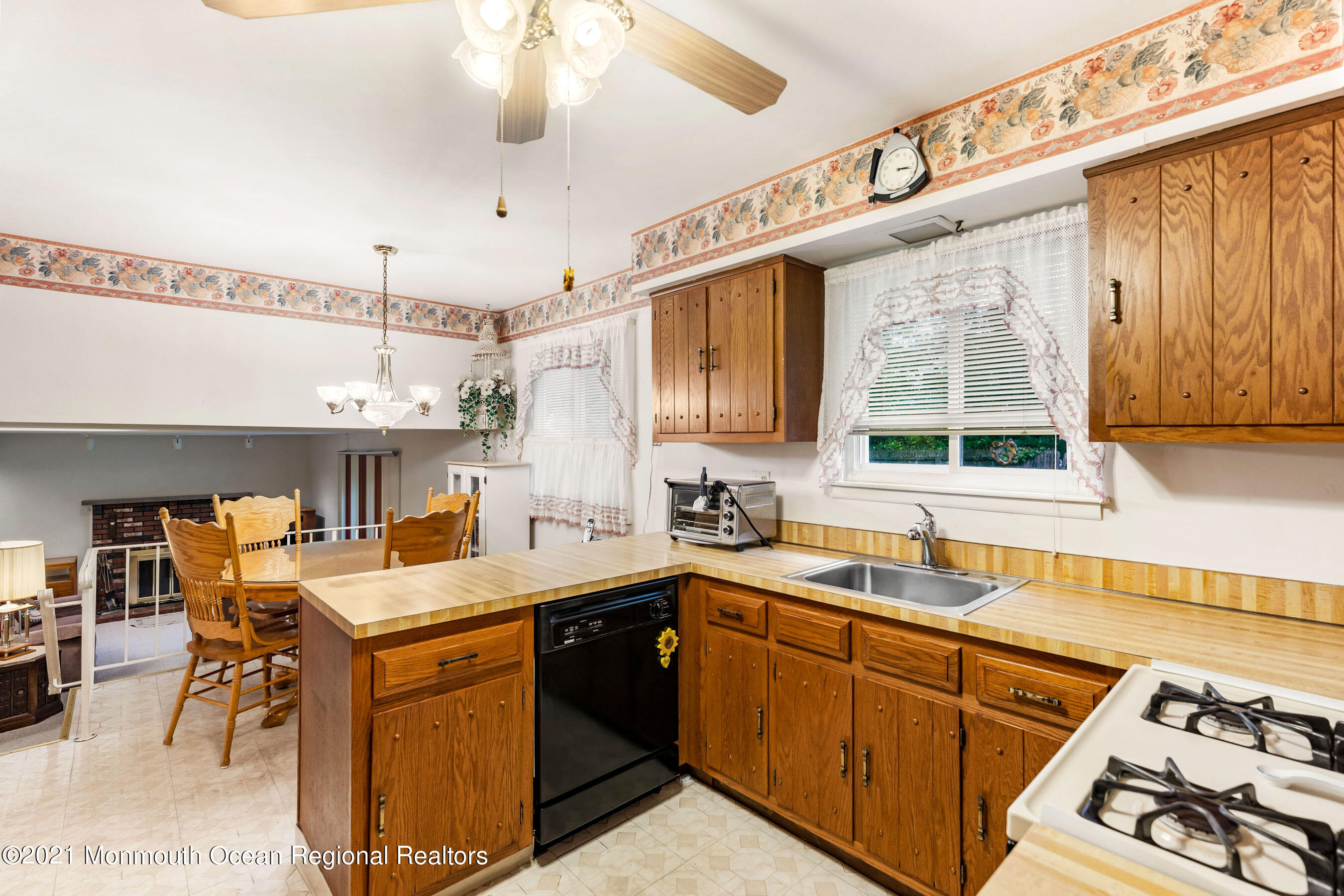 11 Flintlock Drive Howell, NJ 07731 - Photo 5 of 29 a kitchen with a sink stove and cabinets