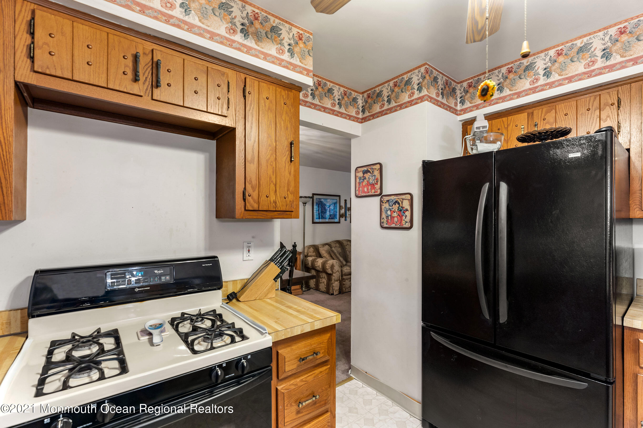 11 Flintlock Drive Howell, NJ 07731 - Photo 6 of 29 a kitchen with stainless steel appliances granite countertop a refrigerator and a stove