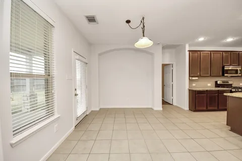 a view of a kitchen with a sink and dishwasher kitchen view