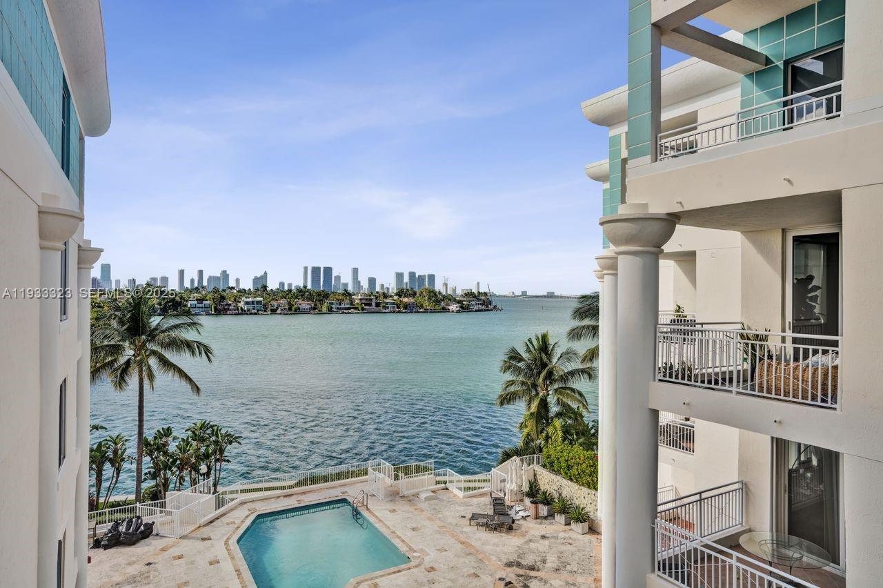 1 Century Lane, Unit 510 Miami Beach, FL 33139 - Photo 18 of 32 a view of a lake with a terrace