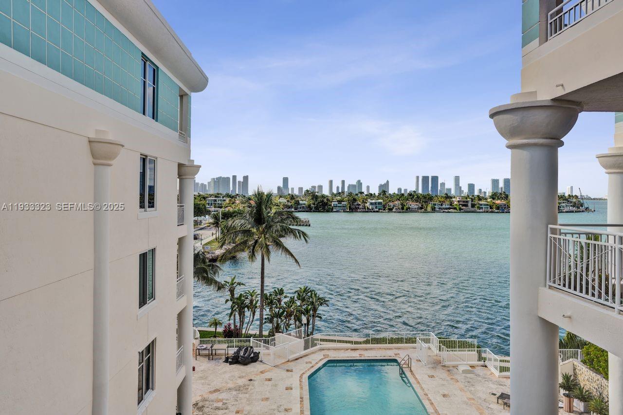 1 Century Lane, Unit 510 Miami Beach, FL 33139 - Photo 19 of 32 a view of a lake with a building in the background