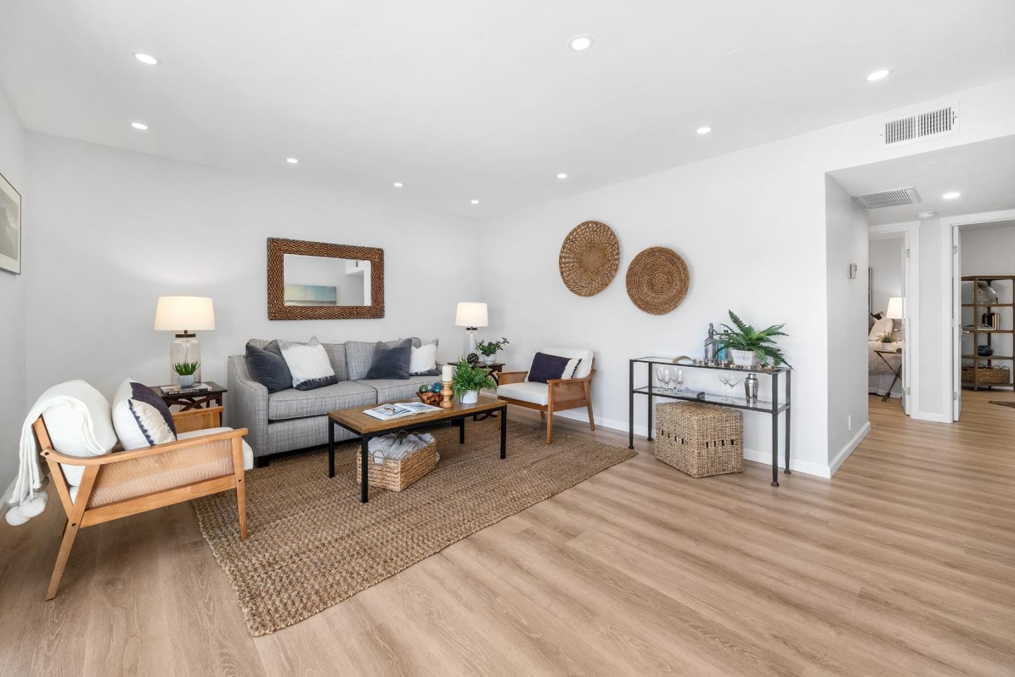 1925 46th Avenue, Unit 148 Capitola, CA 95010 - Photo 4 of 42 a living room with furniture and wooden floor