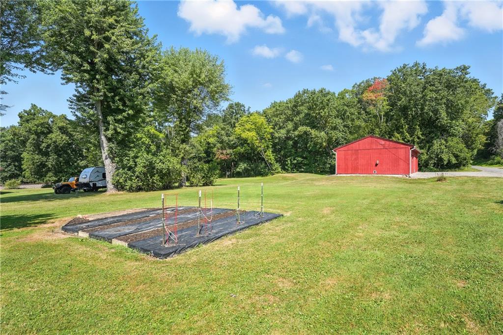153 Wick Road Slippery Rock, PA 16057 - Photo 28 of 43 If you've got a green thumb this level and sunny yard makes a perfect garden.