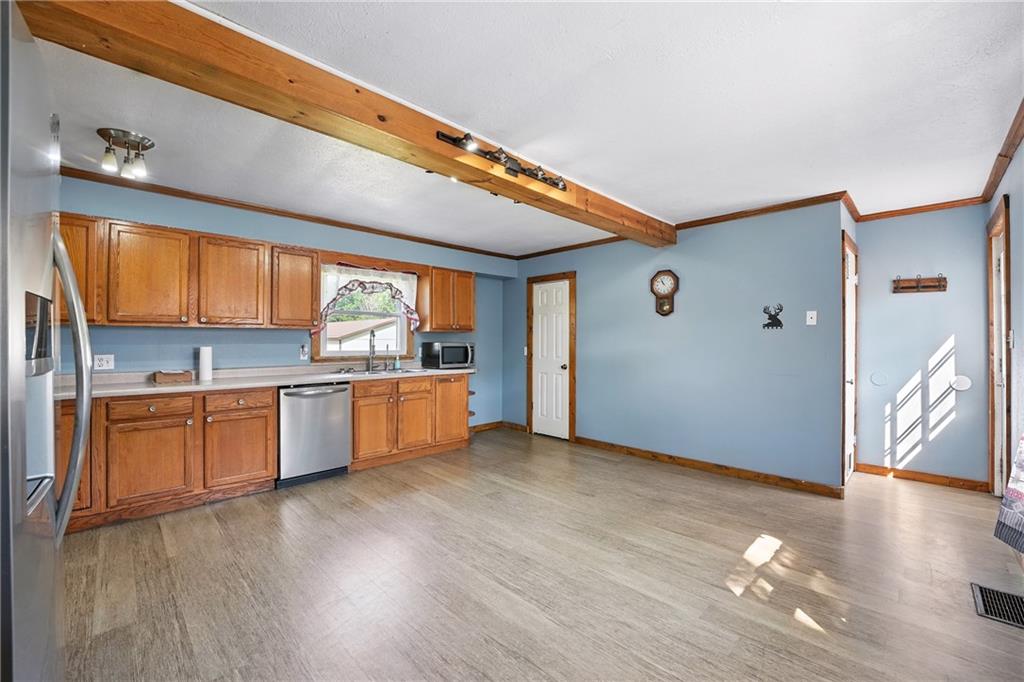 153 Wick Road Slippery Rock, PA 16057 - Photo 4 of 43 Very spacious 17x16 kitchen with room for a table and there is also a full dining room. All appliances are included.
