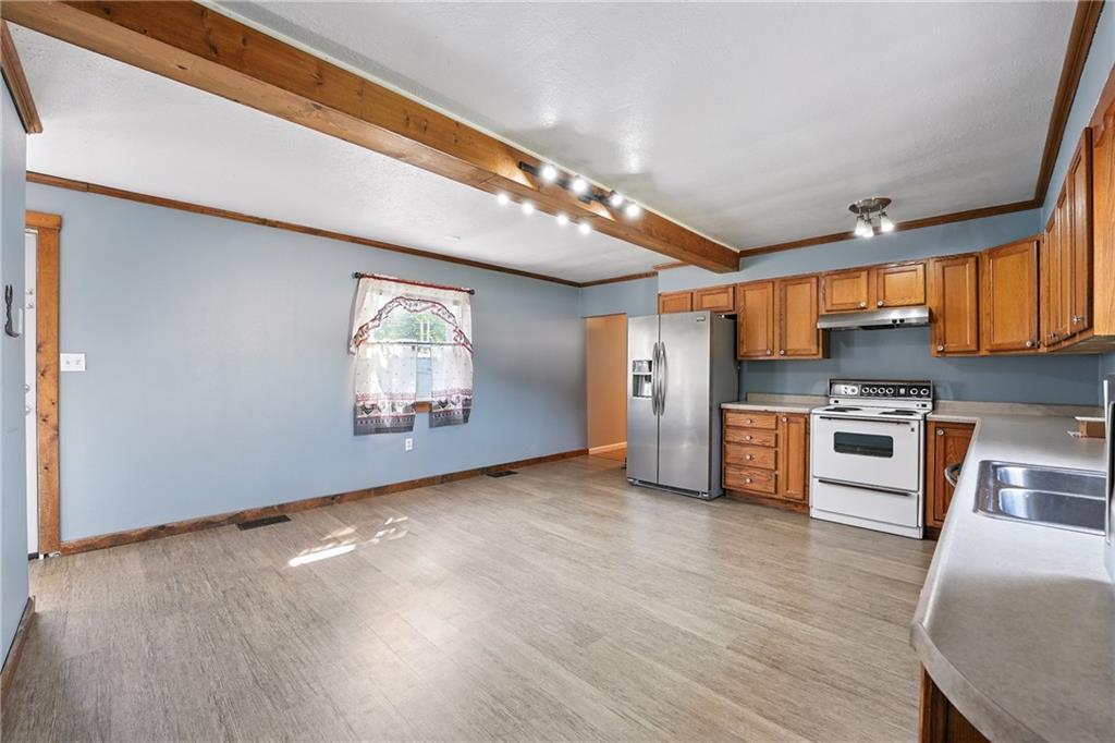 153 Wick Road Slippery Rock, PA 16057 - Photo 6 of 43 Very spacious 17x16 kitchen with room for a table and there is also a full dining room. All appliances are included.