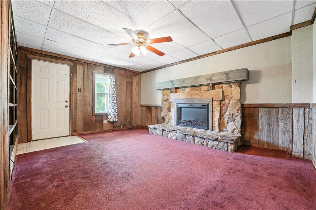 153 Wick Road Slippery Rock, PA 16057 - Photo 8 of 43 Living room with electric insert fireplace.