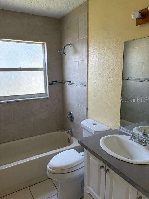 7544 Humboldt Avenue New Port Richey, FL 34655 - Photo 5 of 8 a bathroom with a sink toilet and shower