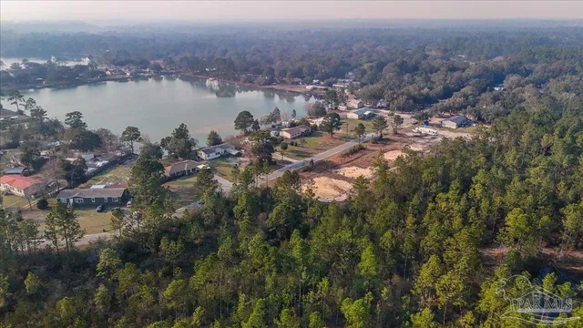 a view of a lake with a city