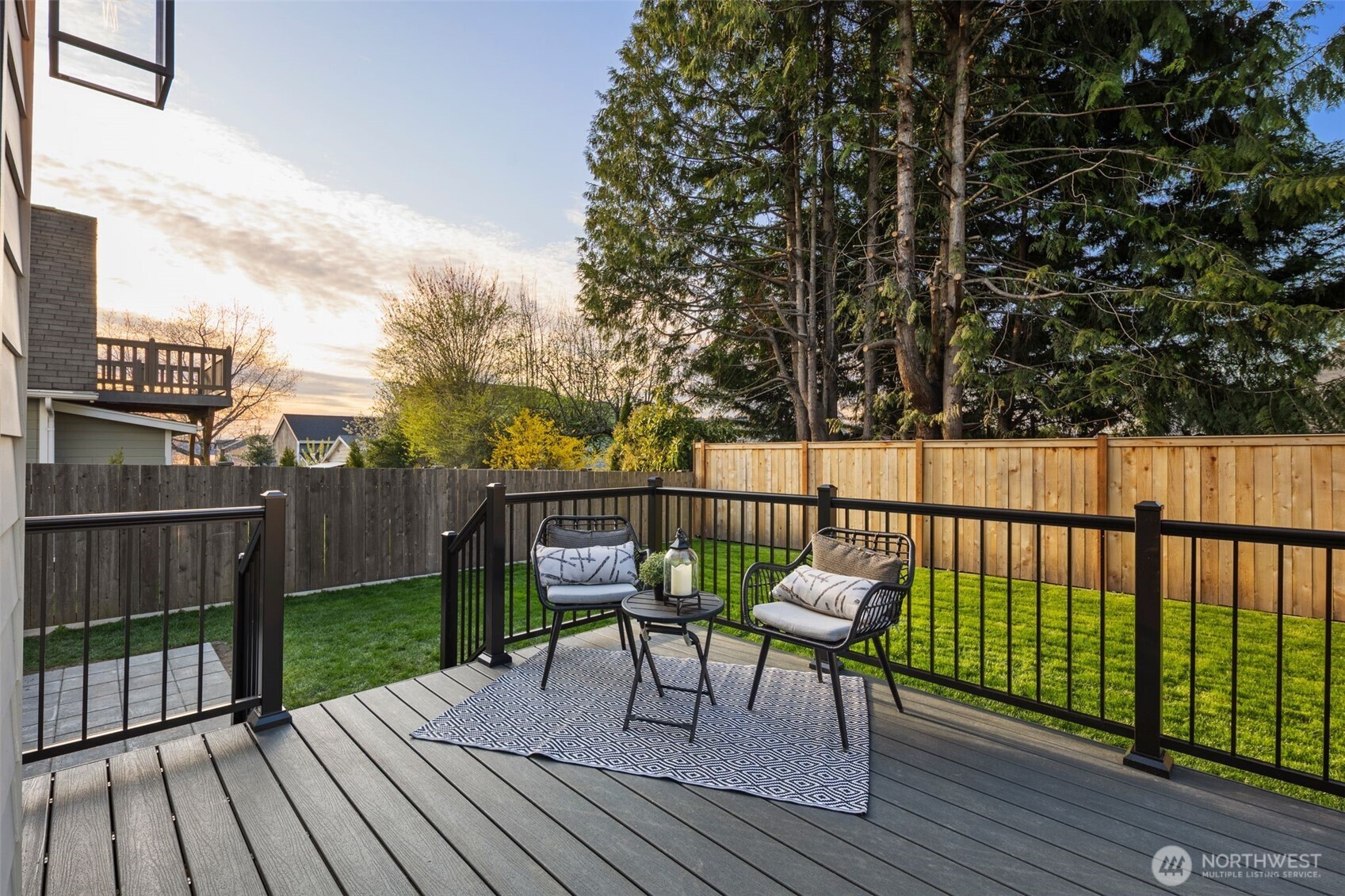 1002 North 31st Street Renton, WA 98056 - Photo 4 of 5 a view of a chairs on wooden deck