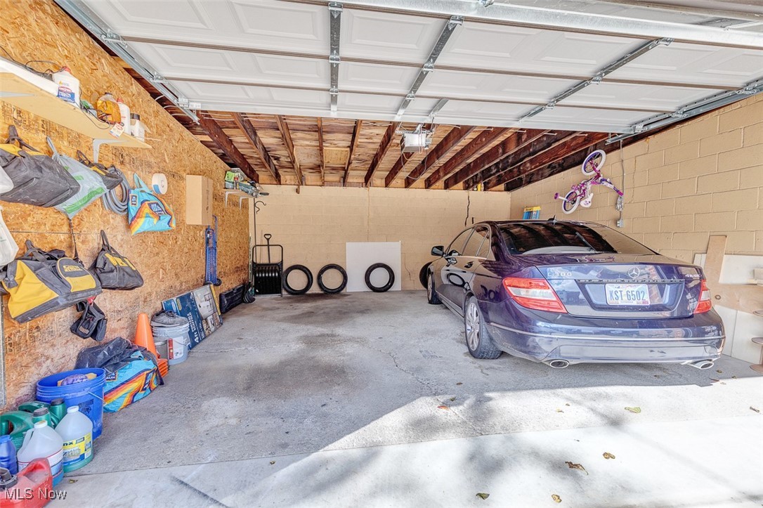 6136 Ridge Road Cleveland, OH 44129 - Photo 5 of 40 Garage featuring a garage door opener