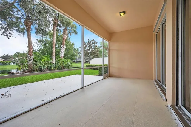 a view of a room with porch and a yard