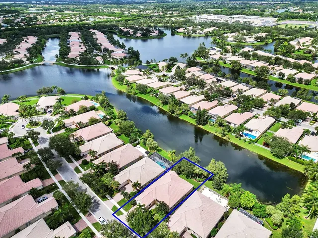 an aerial view of lake residential house with outdoor space