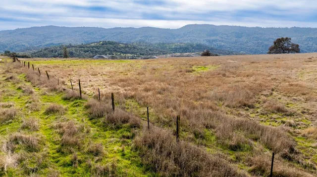 a view of an outdoor space and mountains