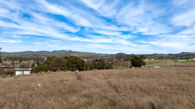 a view of lake with mountain