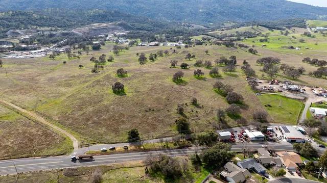 an aerial view of residential house and outdoor space