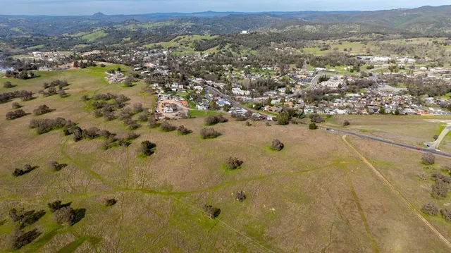 an aerial view of residential house with parking space