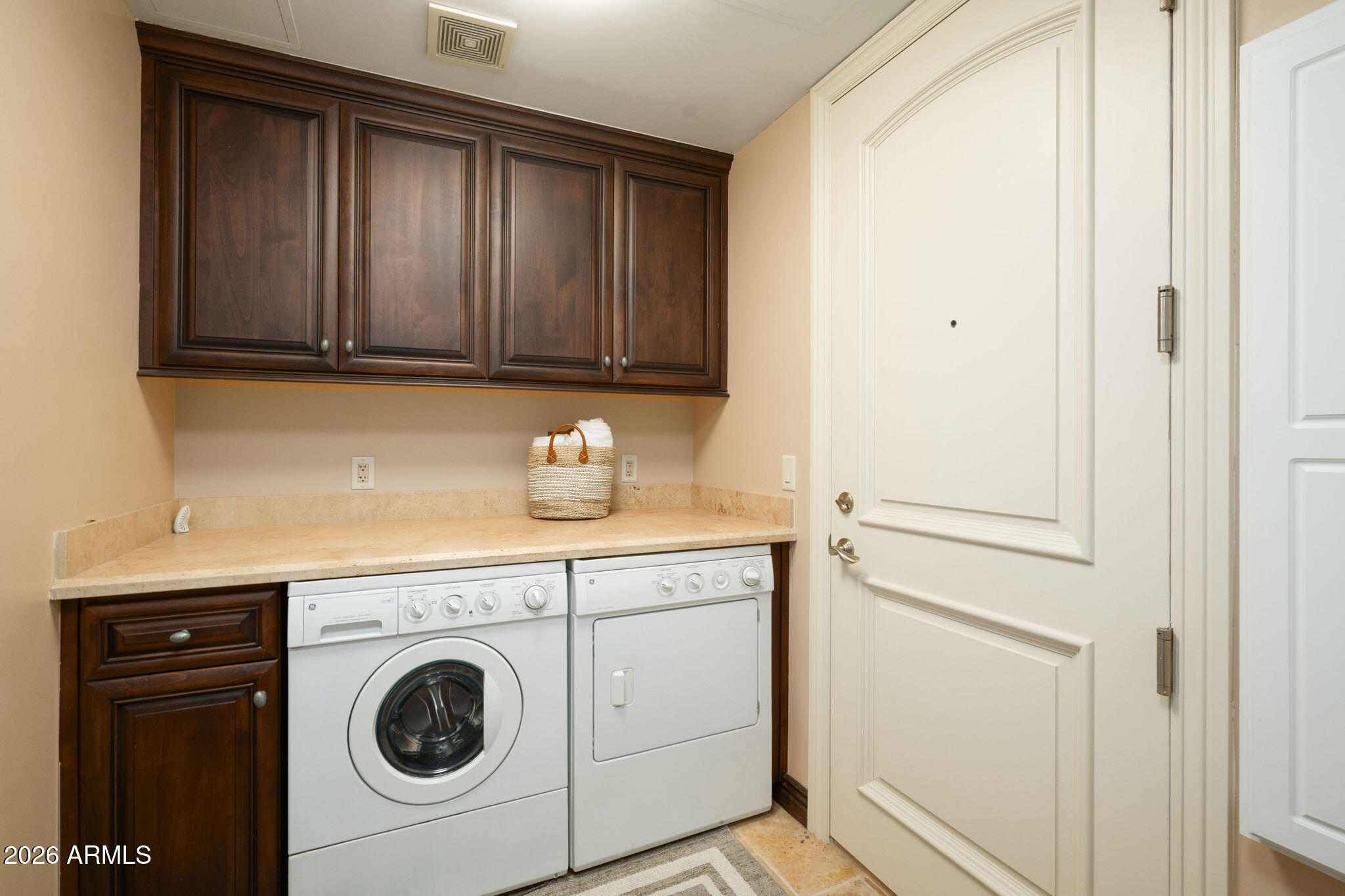 7181 East Camelback Road, Unit 1001 Scottsdale, AZ 85251 - Photo 11 of 34 a view of a storage and utility room with washer and dryer
