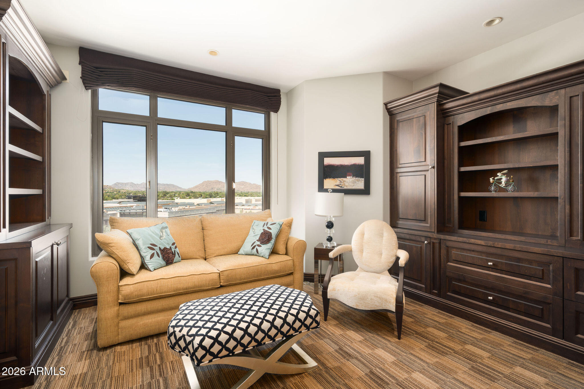 7181 East Camelback Road, Unit 1001 Scottsdale, AZ 85251 - Photo 17 of 34 a living room with furniture and a window