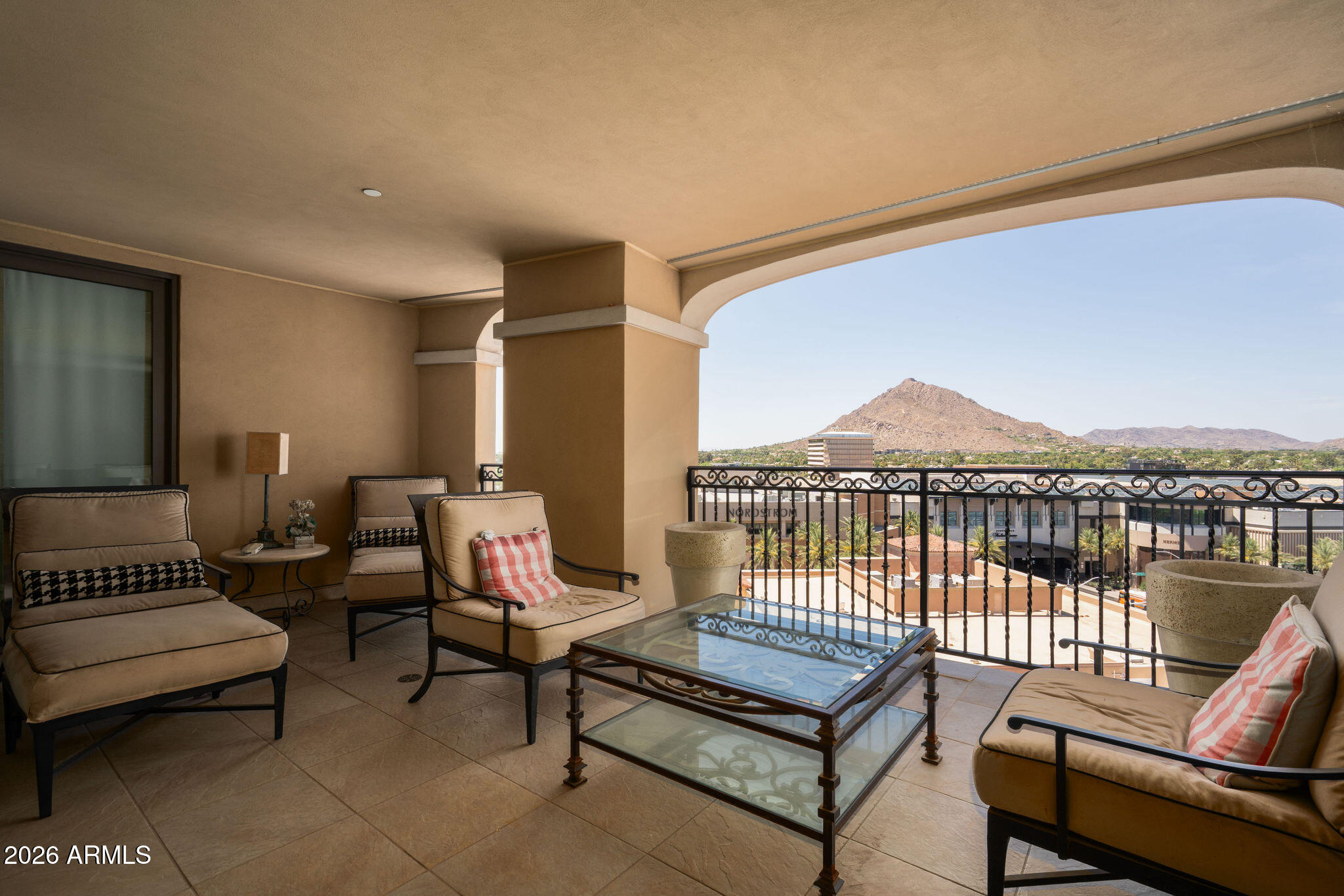 7181 East Camelback Road, Unit 1001 Scottsdale, AZ 85251 - Photo 27 of 34 a view of a terrace with furniture