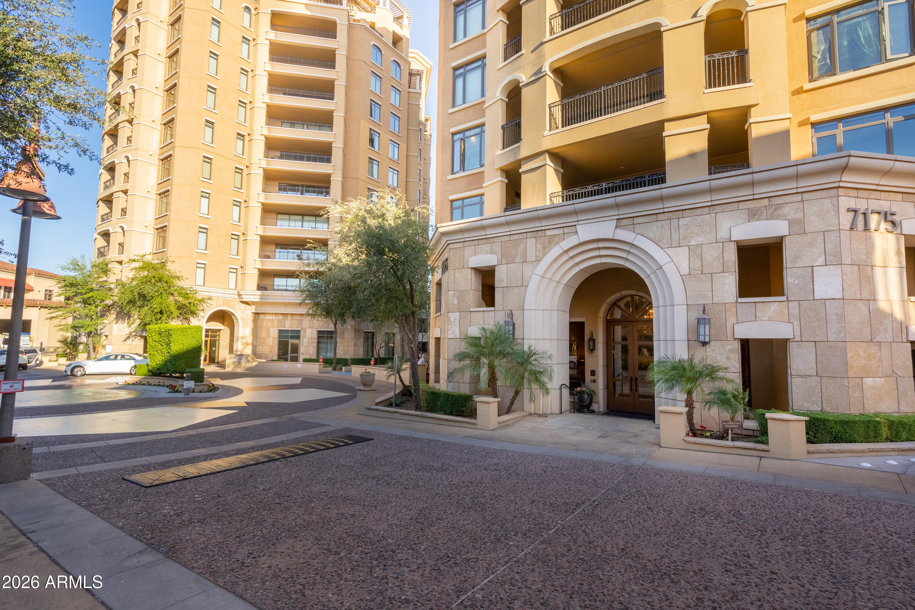 7181 East Camelback Road, Unit 1001 Scottsdale, AZ 85251 - Photo 31 of 34 a view of a building with a street