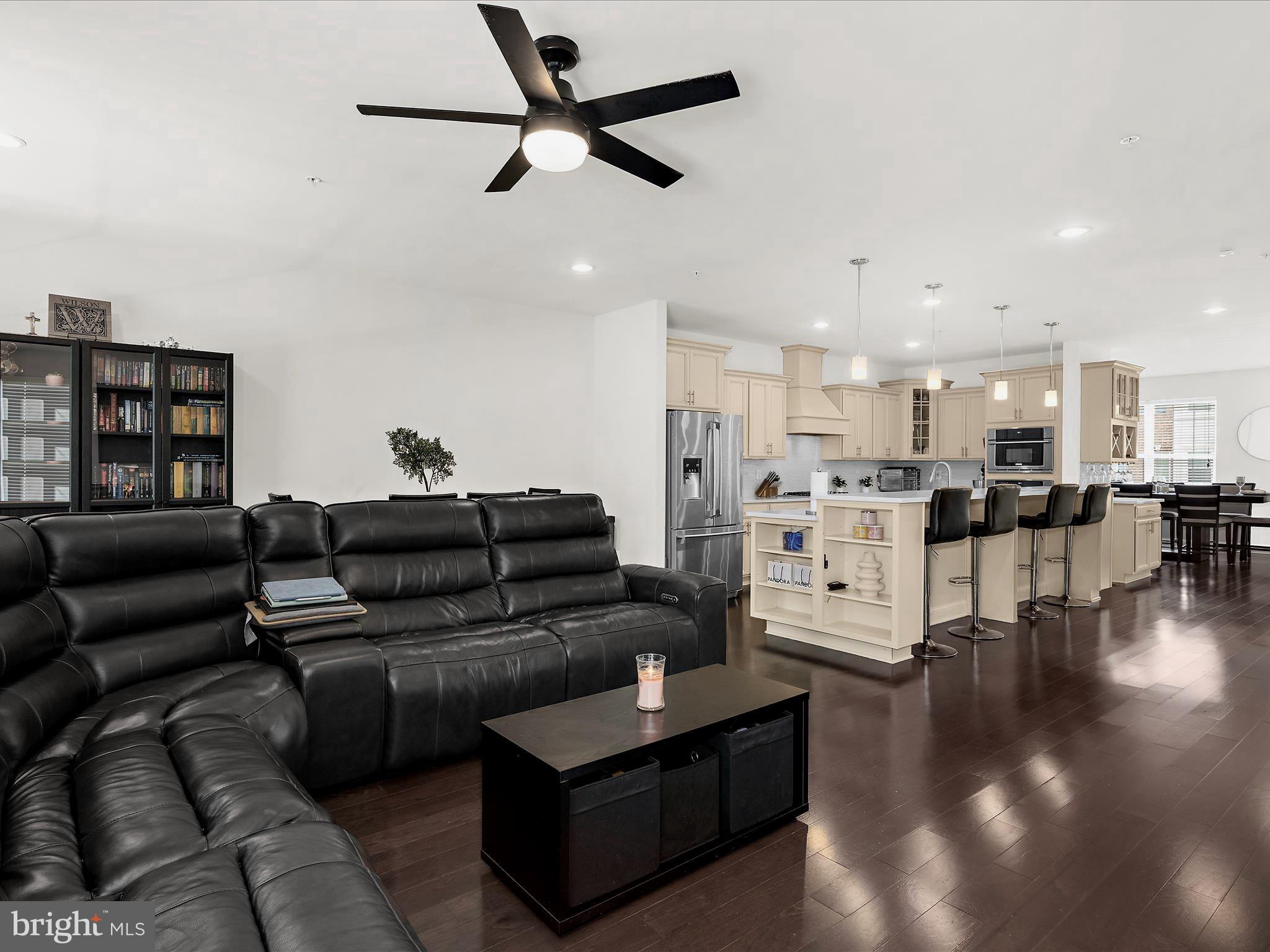 1239 Orchid Road Gambrills, MD 21054 - Photo 11 of 58 a living room with furniture and kitchen view