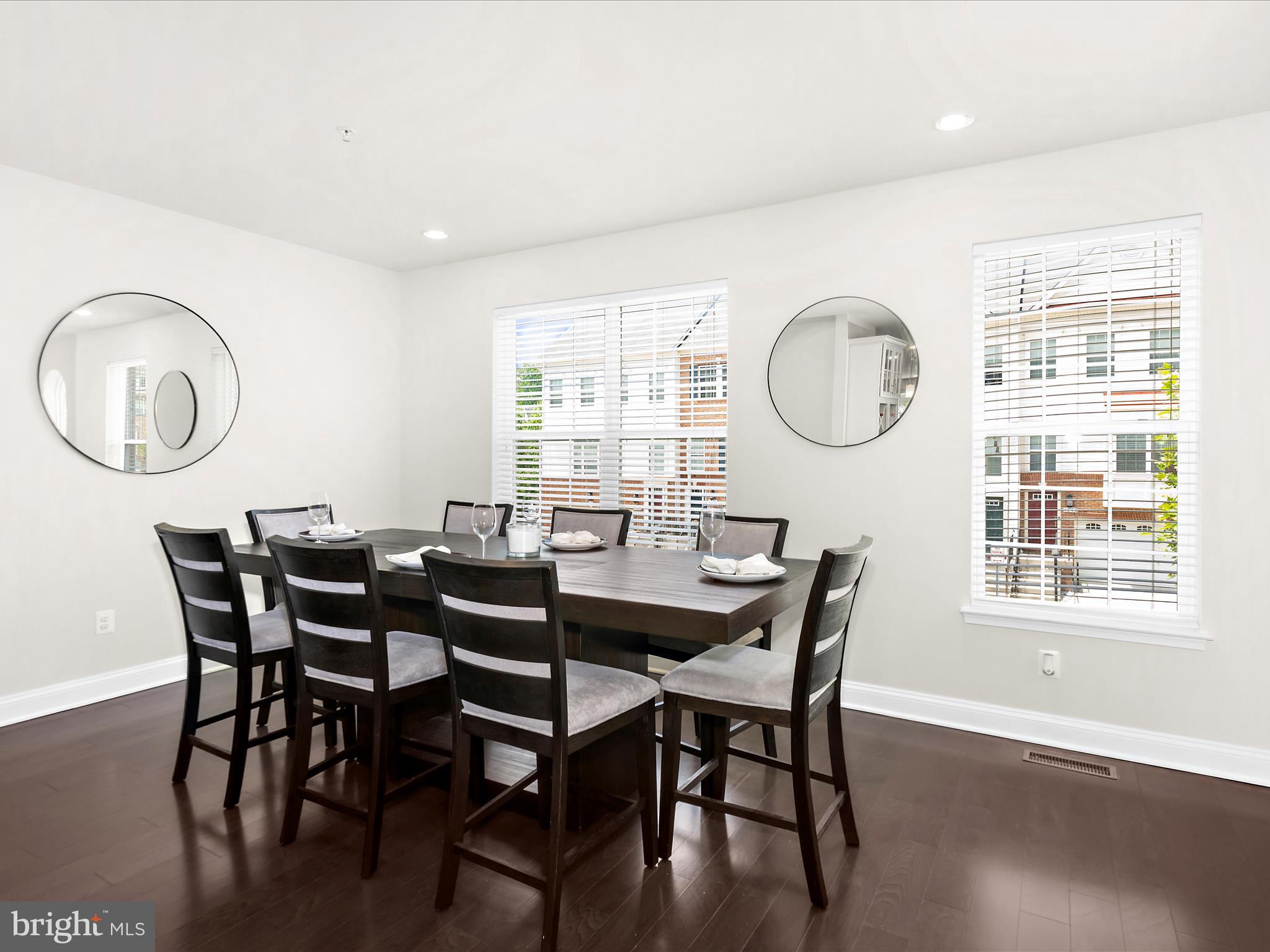 1239 Orchid Road Gambrills, MD 21054 - Photo 17 of 58 a view of a dining room with furniture and wooden floor