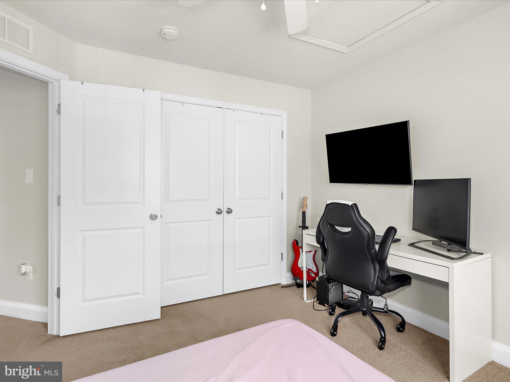 1239 Orchid Road Gambrills, MD 21054 - Photo 28 of 58 a view of a workspace with furniture and wooden floor