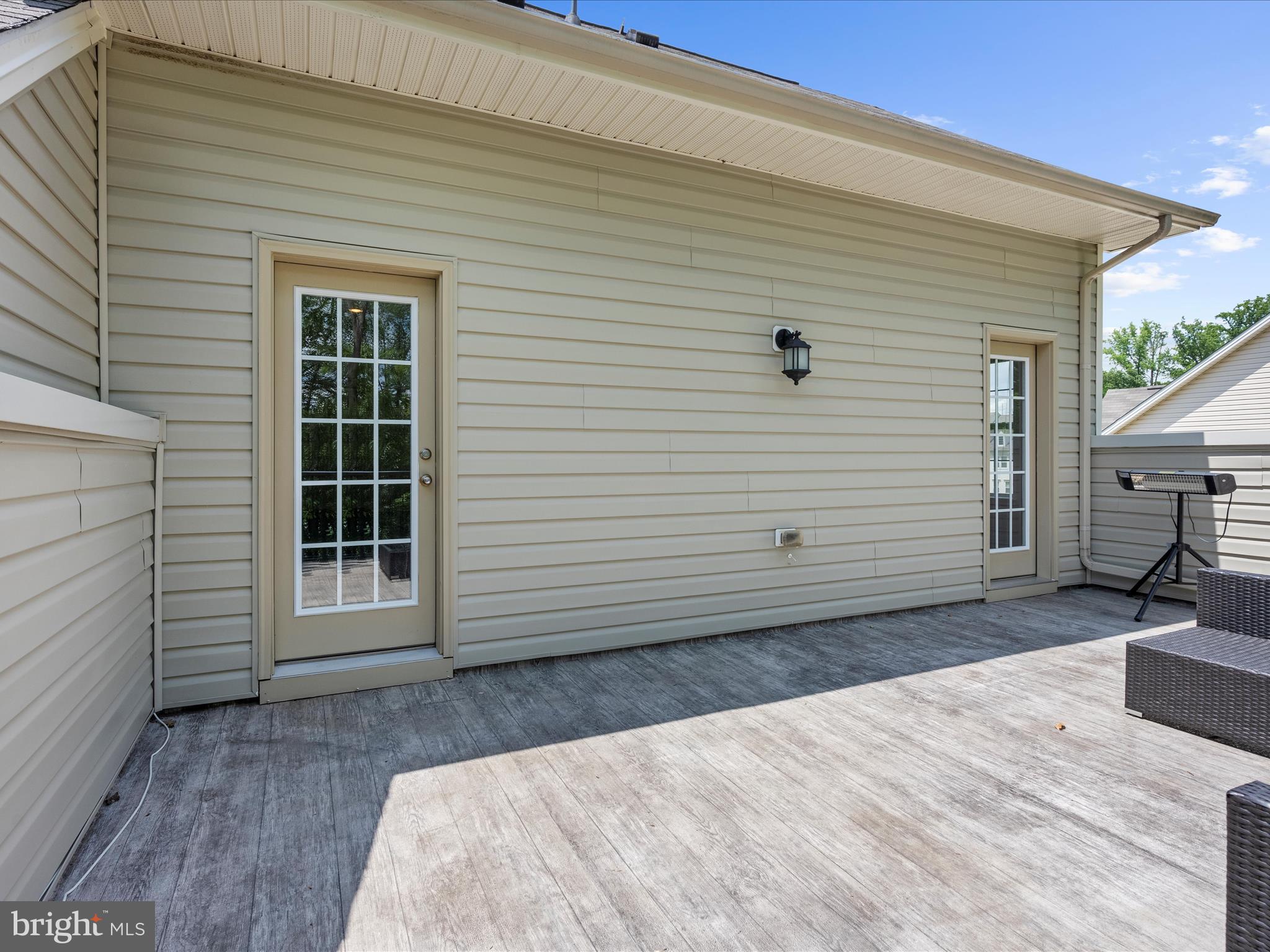 1239 Orchid Road Gambrills, MD 21054 - Photo 35 of 58 a view of a house with a white door