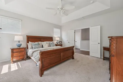 a bed room with a bed and dresser