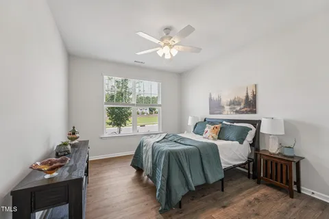 a bed room with a bed and a couch