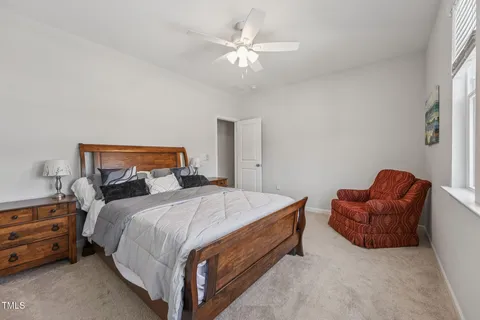 a bathroom with double sink and a mirror