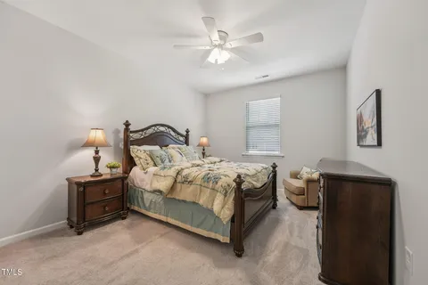 a work room with furniture and a window