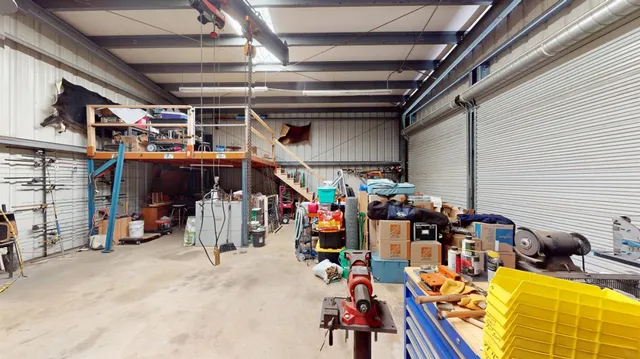 a view of a storage room with furniture