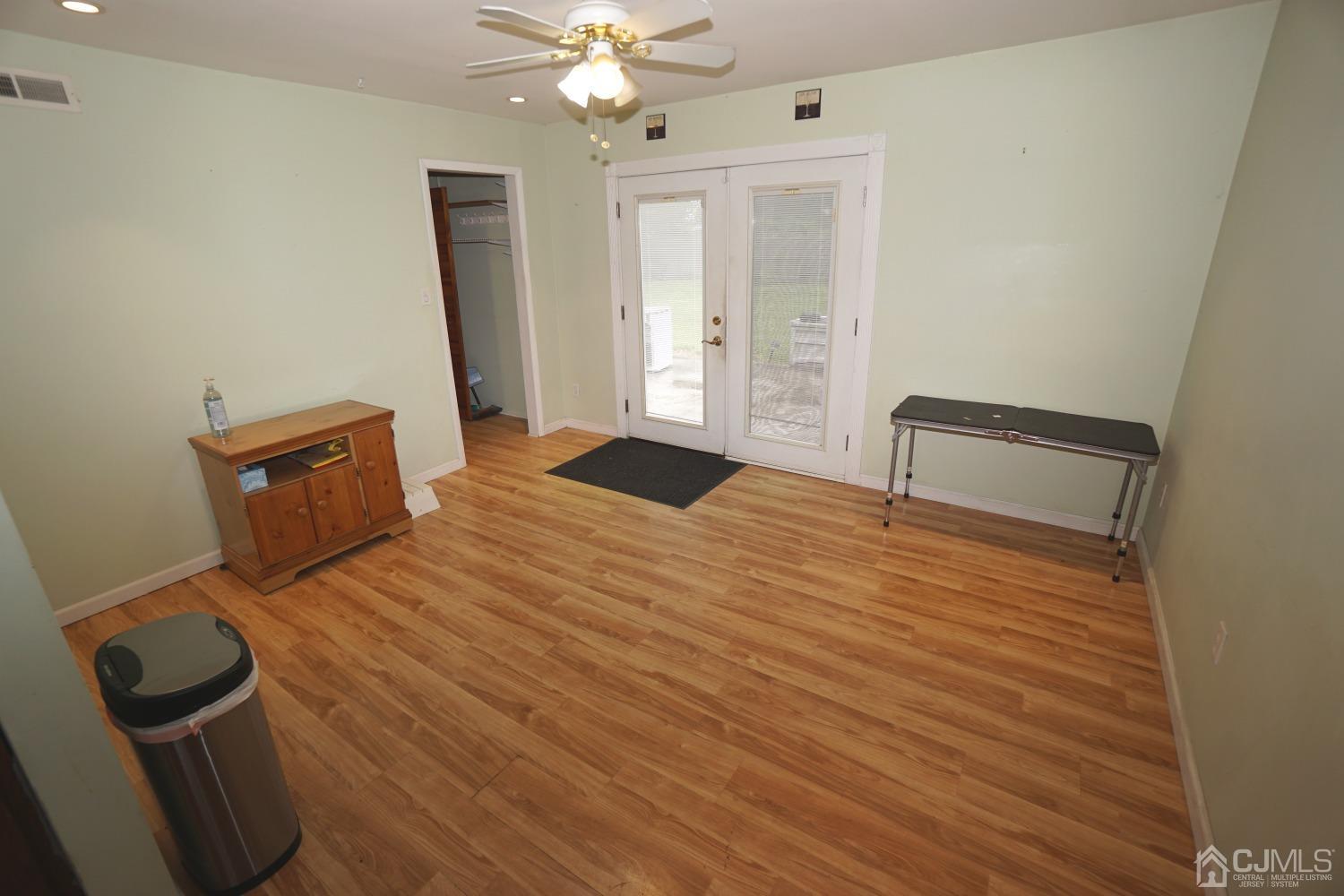 4 Piedmont Road Edison, NJ 08817 - Photo 11 of 22 a bedroom with a bed and a mirror