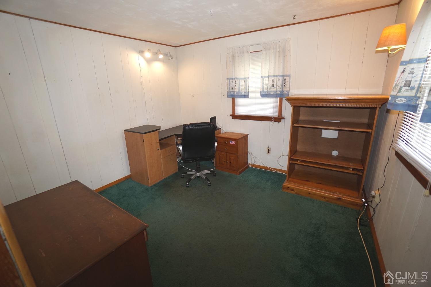 4 Piedmont Road Edison, NJ 08817 - Photo 16 of 22 a room with cabinets and a wooden floor