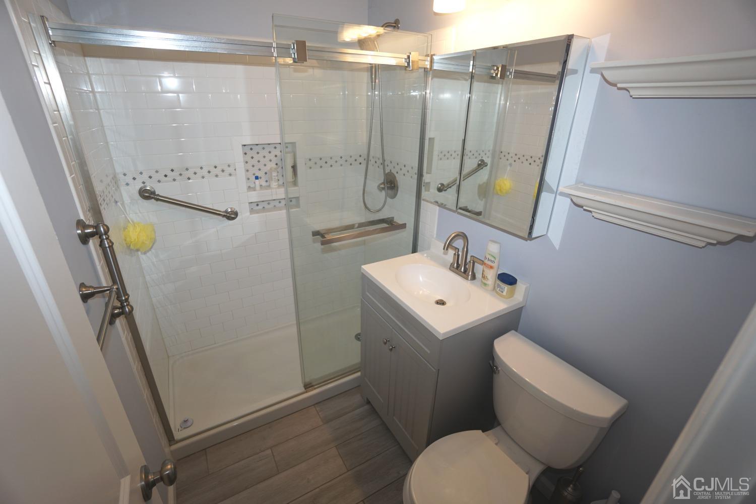 4 Piedmont Road Edison, NJ 08817 - Photo 17 of 22 a bathroom with a sink toilet and shower