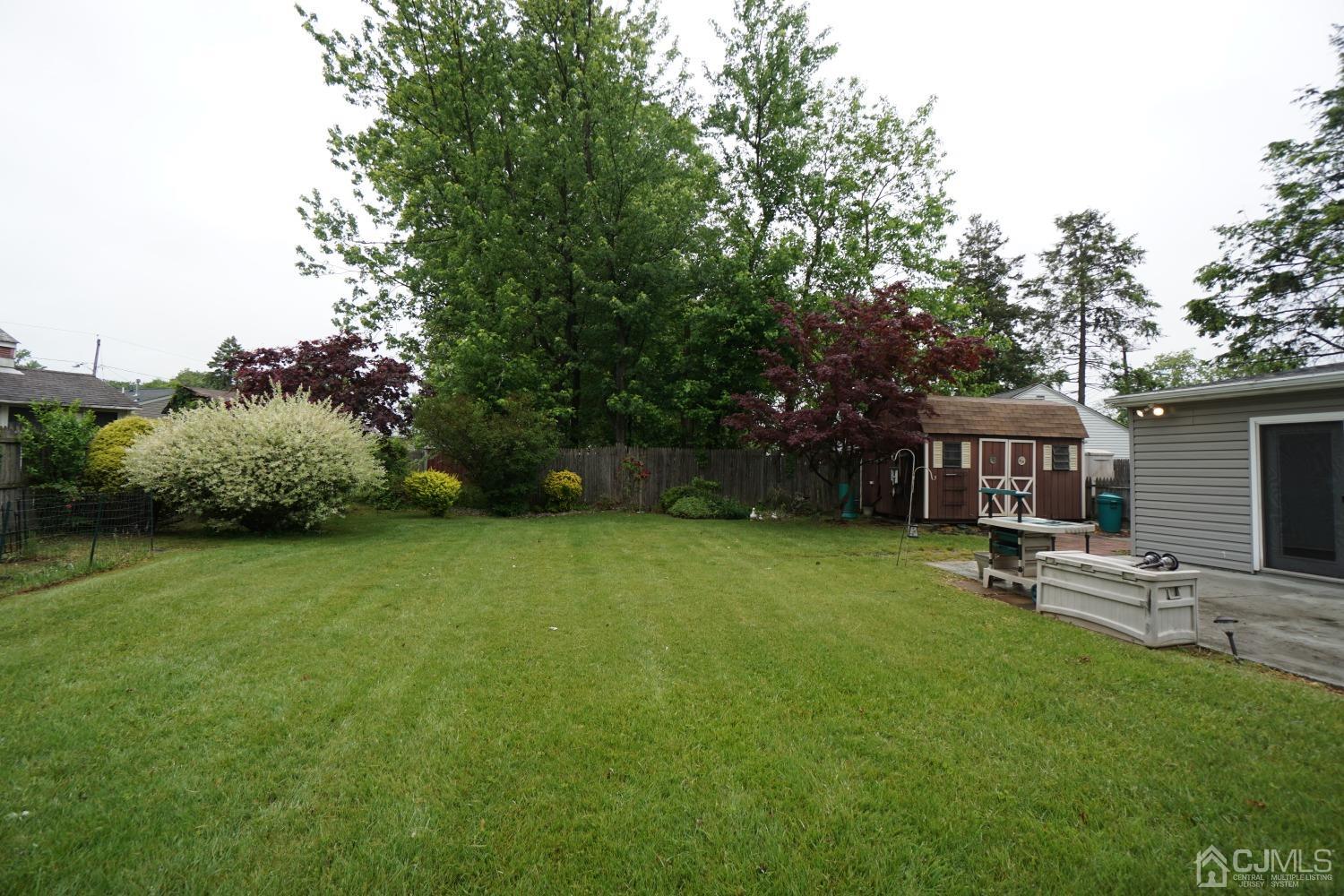4 Piedmont Road Edison, NJ 08817 - Photo 22 of 22 a view of a backyard with sitting area